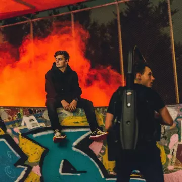 Sneakers Adidas Hu Nmd "solar Pack"  worn by Martin Garrix on his Instagram account  (@martingarrix)