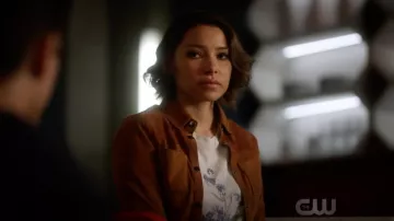The t-shirt John Galt "Forget Me Not" worn by Nora West-Allen (Jessica Parker Kennedy) in Flash S05E02