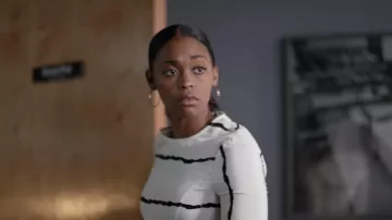 White coat, striped Derek Lam 10 Crosby range by Anissa Pierce (Nafessa Williams) in Black Lightning S01E05