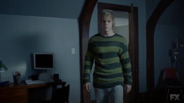Striped Green sweater worn by Tate Langdon (Evan Peters) as seen in American Horror Story S08E06