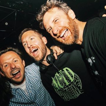The black t-shirt Acid Hotline by Wasted Paris worn by Calvin Harris on the account Instagram of @davidguetta