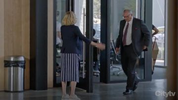 BCBGMAXAZRIA Striped Asymmetrical Pencil Skirt worn by Claire Dunphy (Julie Bowen) as seen in Modern Family S10E03