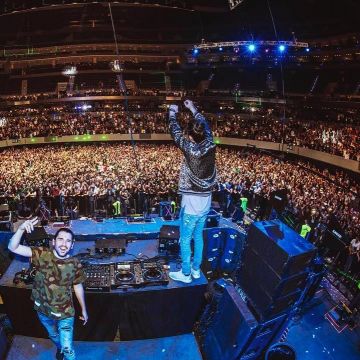 Adidas Ultra Boost 3.0 "triple White" sneakers worn by LikeMike on the Instagram account @dimitrivegasandlikemike