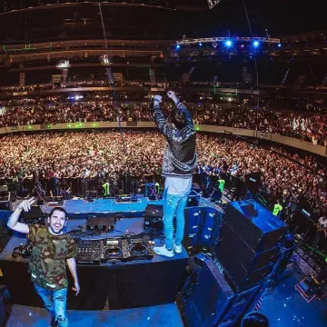 Adidas Ultra Boost 3.0 "triple White" sneakers worn by LikeMike on the Instagram account @dimitrivegasandlikemike