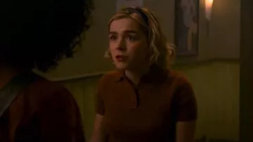 Ur­ban Out­fit­ters Shrunken Fuzzy Polo Sweater worn by Sabrina Spellman (Kiernan Shipka) as seen in Chilling Adventures of Sabrina S01E09
