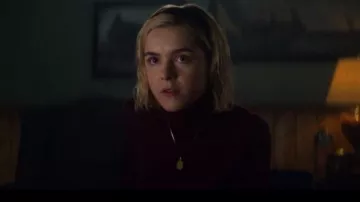 Burgundy turtleneck sweater worn by Sabrina Spellman (Kiernan Shipka) as seen in Chilling Adventures of Sabrina S01E01