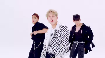 The leather jacket with checkerboard Jooheon in the clip Livin' It Up Monsta X
