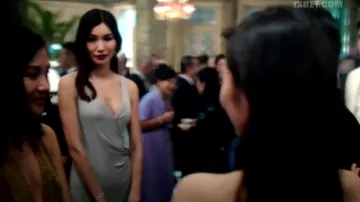 The dress strap worn by Astrid Young Teo (Gemma Chan) in Crazy Rich Asians