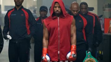 Adonis Johnson's (Michael B. Jordan) red sleeveless hoodie as seen in Creed II