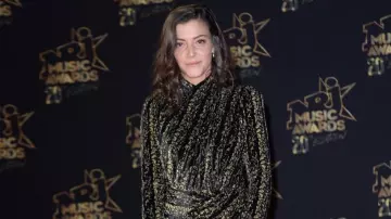The draped Dress black and gold-tone Camille Lellouche in NRJ Music Awards 2018