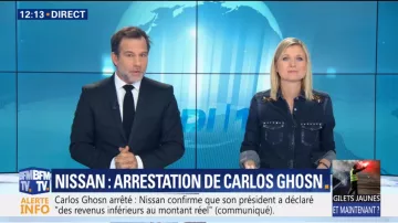 La camisa negra ligeramente descolorida con bordados en los hombros de Karine de Ménonville en BFMtv del 19/11/2018