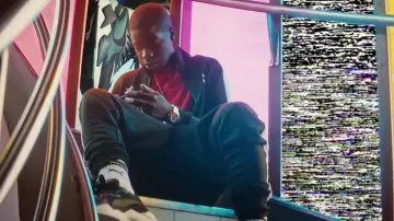 The pair of sneakers Puma RS-X scope by MHD in the Youtube video Alonzo x MHD x St Maximin