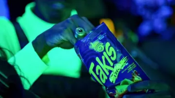 Takis Fuego Tortilla Corn Chips in Say My Name music video by David Guetta, Bebe Rexha & J Balvin