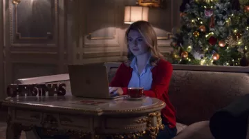 The Apple MacBook Air laptop of Amber (Rose McIver) in A Christmas Prince : The Royal Wedding
