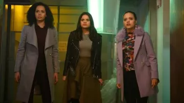 The skirt khaki 3.1 Phillip Lim worn by Mel Vera (Melonie Diaz) in Charmed S01E08