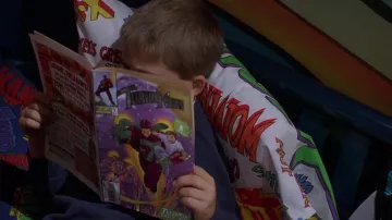 The comic book TurboMan #1) Jamie Langston (Jake Lloyd) in The Race to the toy
