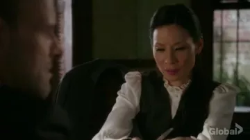L'Inde Le Palais x Isabel Marant Sloan White silk shirt worn by Dr. Joan Watson (Lucy Liu) in Elementary S06E14