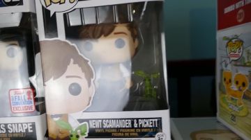 The figurine Funko Pop of Newt Scamander in the video "MY ENTIRE COLLECTION OF FUNKO POP !!"