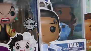 The figurine Funko Pop of Tiana in the video "MY ENTIRE COLLECTION OF FUNKO POP !!"