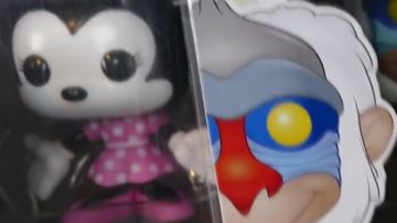 The figurine Funko Pop Minnie Mouse in the video "MY ENTIRE COLLECTION OF FUNKO POP !!"