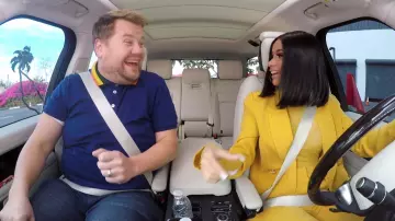 Gucci Polo shirt with wolf appliqué worn by James Corden in Carpool Karaoke with Cardi B