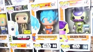 The figurine Funko Pop Goku blue Super Saiyan in the YouTube video, "ALL OUR POP FUNKO !"