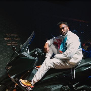 Sneakers Nike Orange Mac Tyer on the account Instagram @mactyer_officiel