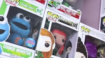 The figurine FunKo Pop Cookie Monster in the YouTube video, "ALL OUR POP FUNKO !"
