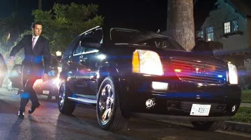 GMC Yukon SUV conducido por el agente Simmons (John Turturro) en Transformers