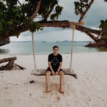 The black t-shirt with a cross worn by Martin Garrix on his account Instagram @martingarrix
