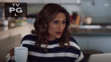 Self Portrait puff sleeve striped sweater worn by Emet (Sarayu Blue) in I Feel Bad S01E13