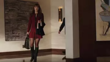 High knee boots worn by Anastasia Steele (Dakota Johnson) as seen in Fifty Shades Freed
