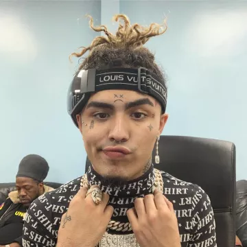 black and white t-shirt with all over writen 'T-SHIRT' worn by Lil Pump on his Instagram account @lilpump