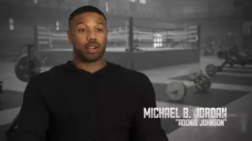 Le sweatshirt à capuche Mai­son Mar­giela  porté par Michael B. Jordan lors d'une interview pour la sortie de Creed II