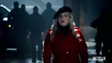 The red coat of Katheryn Winnick in Polar
