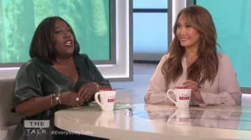 Eloquii Flare Sleeve Tie Waist Faux Leather Top worn by Sheryl Underwood on The Talk Jan 11, 2019