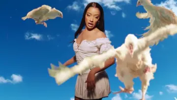 The white skirt of Shay in the clip Cocorico