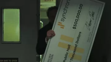 Synchrony bank service as seen on the check signed by Pepper Potts in Spider-Man: Far from Home