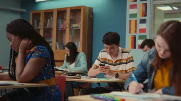 Otis' (Asa Butterfield) striped polo as seen in Sex Education S01E04