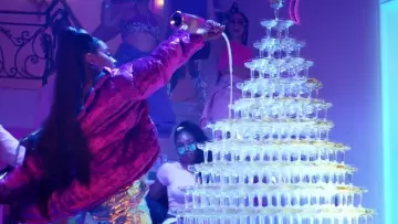 Galaxy hologram pants worn by Ariana Grande in 7 rings music video