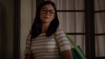 Frame white striped ribbed top worn by Lisa Apple (Monica Barbaro) in Splitting Up Together (S02E02)