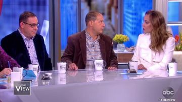 Blazé Milano Sunshine belted cotton blend bouclé mini dress worn by Sunny Hostin on The View