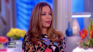 Peter Pilotto Asymmetric floral print stretch silk cloqué blouse worn by Sunny Hostin on The View