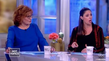 McQ Alexander McQueen Bodycon Striped Lace Up Cardigan usado por Abby Huntsman en The View