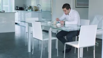 The glass table in the dining room of Davis (Jake Gyllenhaal) in Demolition