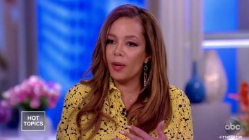 Cédric Charlier Asymmetric floral print silk crepe de chine midi dress worn by Sunny Hostin on The View February 8, 2019