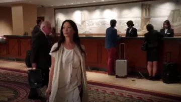 Black Crane  Long Slit Coat worn by Dr. Joan Watson (Lucy Liu) in Elementary (S03E01)