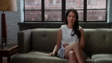 Bcbgmaxazria  Alyssa Sleeveless Asymmetrical Overlay Top worn by Dr. Joan Watson (Lucy Liu) in Elementary (S03E03)