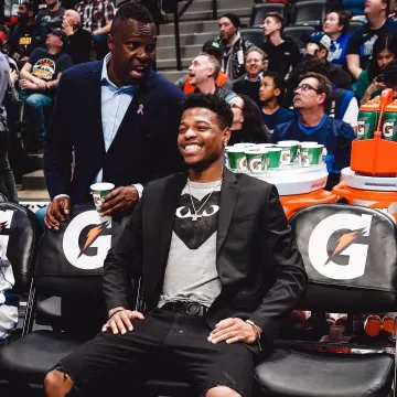 Comme Des Garçons Play heart motif T-shirt worn by Dennis Smith Jr. on the Instagram account @desmith4