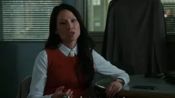 Ann Taylor Cachemire Recadrée Shell dans Russet Orange porté par le Dr Joan Watson (Lucy Liu) dans le Primaire (S05E14)